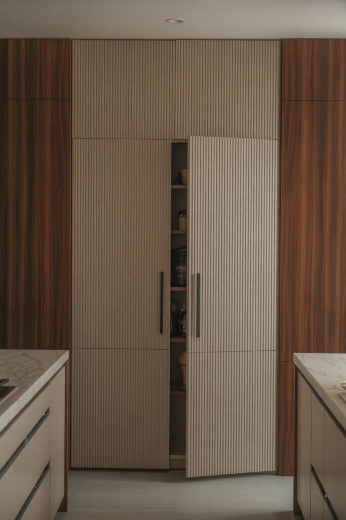 Hidden Pantry with Fluted Panels