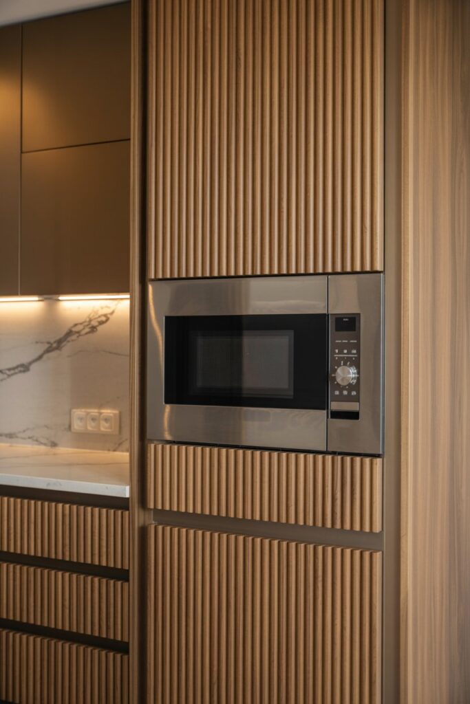 Microwave Hidden Behind Fluted Panel