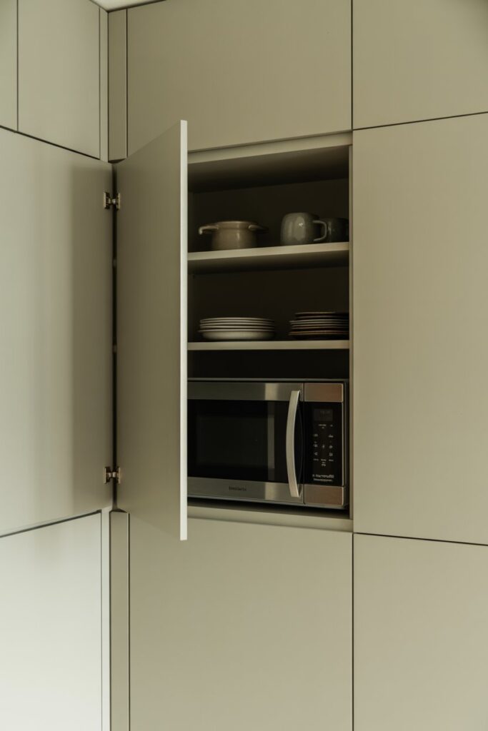 Hidden Corner Microwave Behind Door