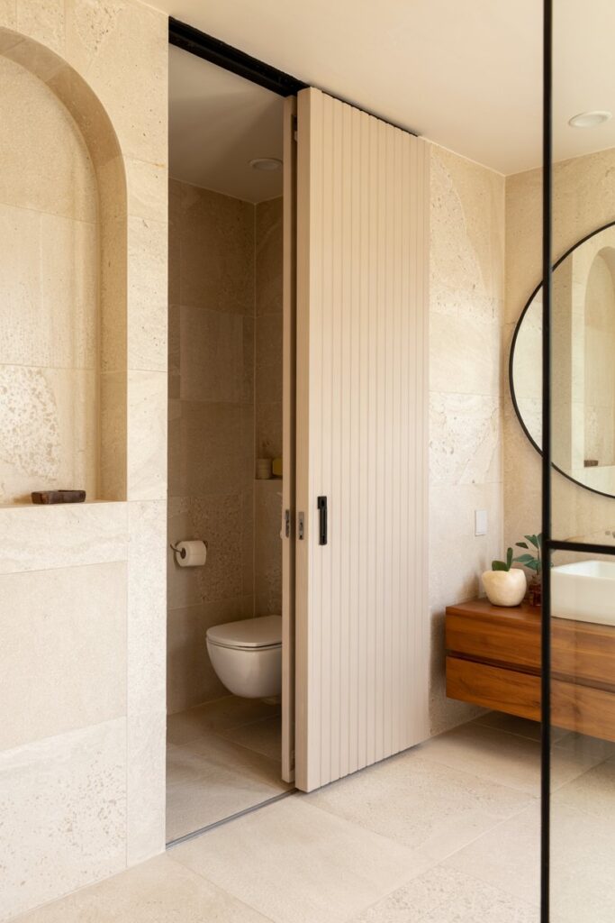 Hidden Door with Vertical Groove Panels