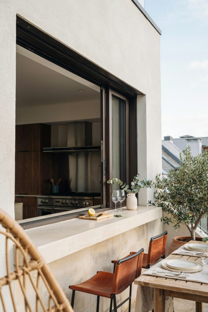 Kitchen with Balcony Serving Window